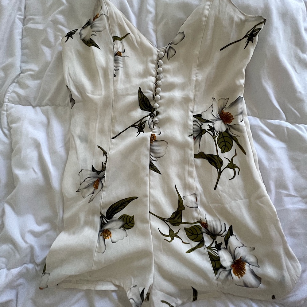 White floral v-neck chiffon lined romper with button details